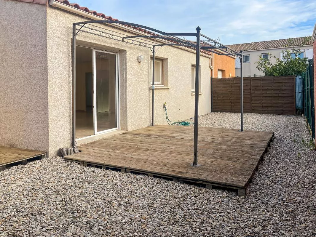 Vente maison plain-pied à Marseillan avec jardinet et garage proche port